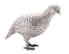 An Elizabeth II cast silver figure of a bird, realistically modelled as a standing grouse,