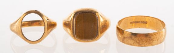 A group of three 9ct gold rings,