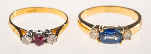 Two gem-set rings, including a three stone ring,