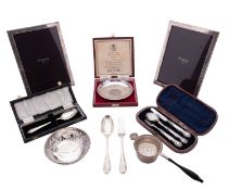 A mixed lot of silver, to include 2 mounted wooden photograph frames, by Asprey,