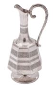 A 20th century Iranian silver ewer or jug, with an octagonal body,