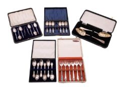 Three cased sets of silver flatware, a pair of Victorian Scottish silver berry spoons,