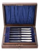 A George V cased set of six pairs of silver dessert knives & forks,