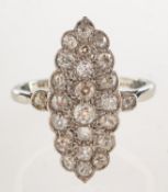 A diamond ring, (possibly 1920's/30's), of navette form with scalloped edges,