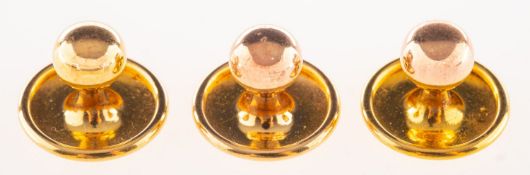 A boxed set of three shirt studs, all marked 9ct, makers mark OP, total gross weight 1.7grams.