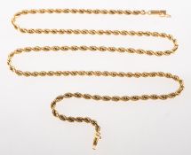 A rope twist chain, with barrel clasp and figure of eight safety catch, tongue marked 14k,