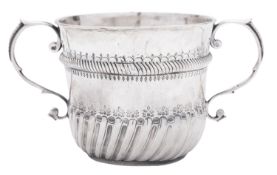 A Queen Anne silver porringer, with twin 