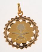 A pendant with the national emblem of Saudi Arabia,