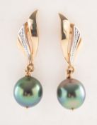 A pair of Tahitian pearl and diamond drop earrings,