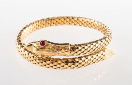 A coiled snake bangle, a flexible coiled snake bangle with openwork 'snake scale' design,