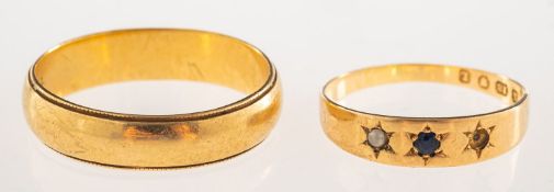 Two 18ct gold rings, including an 18ct gold wedding band, (band misshapen), UK hallmark, 7.