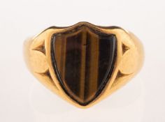 A late Victorian 18ct gold tiger's eye shield ring,