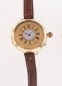 An 18k gold gentleman's half-hunter wristwatch,