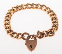 A curb bracelet with heart padlock, and safety chain, UK hallmark to verso of heart padlock for 375,