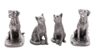 Two contemporary pairs of filled silver figures, one pair of dogs on rounded square bases,
