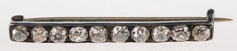 A Victorian diamond bar brooch, grain set with ten old mine-cut diamonds, diamonds approx. 0.
