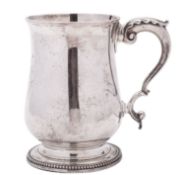 A George III silver mug, baluster form, with a bead border,