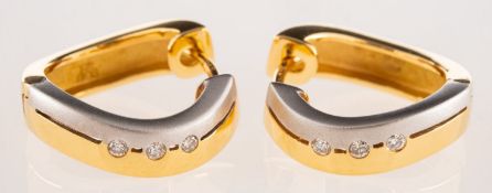A pair of 18ct yellow and white gold diamond hoop earrings,