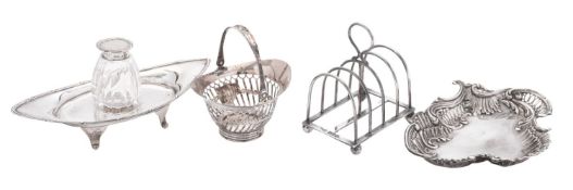 A mixed lot of silver, to include a navette-shaped inkwell, a dish decorated in the Rococo manner,