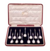 An early 20th century cased set of thirteen silver Apostle tea/ coffee spoons,
