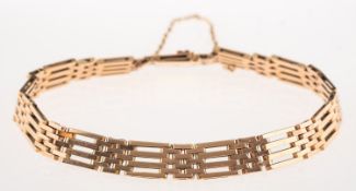 A gate link bracelet, with push in clasp and safety chain, Polish marks? to clasp tongue,