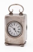 A late Victorian silver travelling carriage clock, rounded rectangular form,