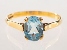 An 18ct gold aquamarine ring, claw set with an oval-cut aquamarine, measuring approx. 8.0mm x 5.