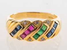 A sapphire, emerald, ruby and diamond ring,