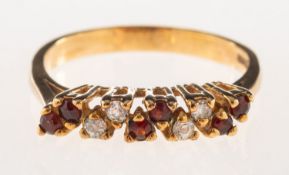 A 9ct gold garnet and paste stone set ring,