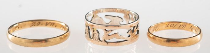 A group of three rings, including a plain wedding band, marked 333 inside shank, (8k),