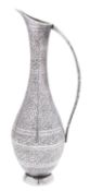 A 20th century Far-Eastern silver ewer, of slender baluster form,