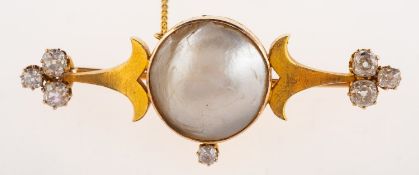 A Victorian mabé pearl and diamond brooch, collet set centrally with a mabé pearl, diameter approx.
