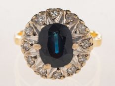 A sapphire and diamond cluster ring,