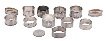 Eleven silver napkin rings, the majority initialled, mixed makers & dates,