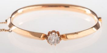 A hinged hollow bangle, a hinged hollow knife-edged bangle,