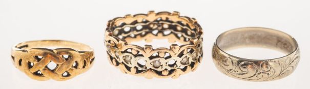 A group of three rings, including a 9ct gold openwork Celtic band, UK hallmark, size M1/2, 2.
