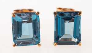 A pair of blue topaz stud earrings, each set with a rectangular-cut blue topaz, topaz approx. 7.