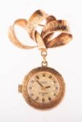 H Angus - a gold-plated nurse's fob watch with bow the dial with raised baton numerals and hands