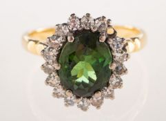 A green tourmaline and diamond cluster ring,