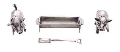 A modern three-piece novelty continental silver pig cruet set, stamped 925,