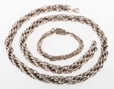 A similar necklace and bracelet, (possibly of Indian or Asian origin),