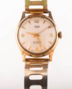 Smiths Everest a 9K gold gentleman's wristwatch the round cream dial signed Smiths Everest,