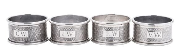 An Elizabeth II cased set of four silver napkin rings,