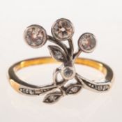 An Art Nouveau diamond ring, a floral and foliate designed ring,