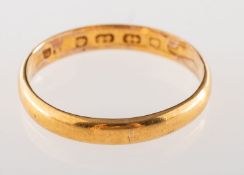 A 22ct gold wedding band, UK hallmark, size P1/2 to Q, 2.7grams.