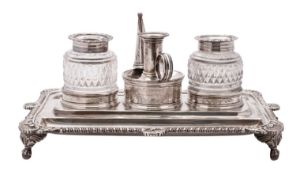 A George III silver inkstand, of shaped rectangular outline,