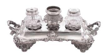 A William IV silver inkstand, shaped rectangular outline, with twin naturalistic handles,