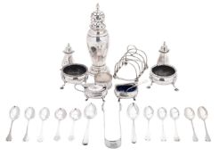 Mixed silver condiments etcetera, to include a pair of salts, a sugar caster, a toast rack,