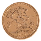A half sovereign in sealed packet, Elizabeth II 2000, total gross weight with sealed packet 4.