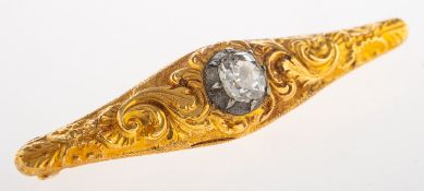 A Victorian diamond brooch, of navette and ornate foliate carved form,